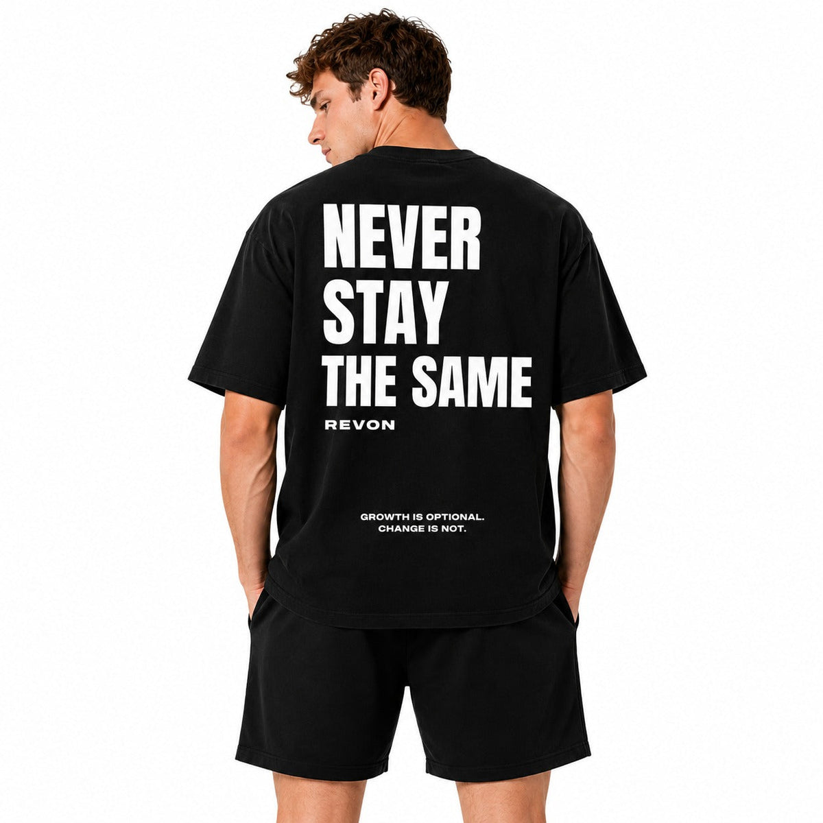 Black tee with black shorts, the Legacy Set from the back
