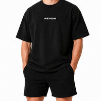 Close on the black Legacy Tee chest logo