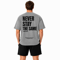 Grey tee with black shorts, the Legacy Set from the back