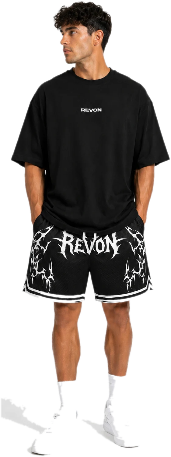 Model wearing the black Legacy oversized tee with the black Legacy mesh shorts