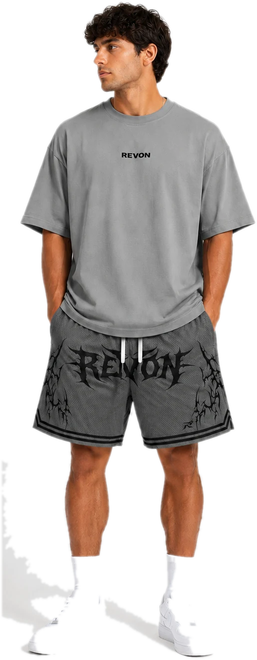 Model wearing the grey Legacy oversized tee with the grey mesh shorts